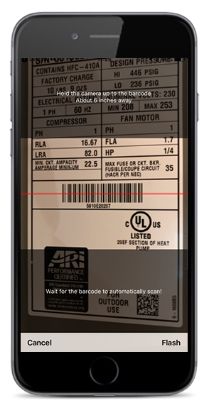 Mobile phone scanning barcode on equipment to look up Lennox warranty.