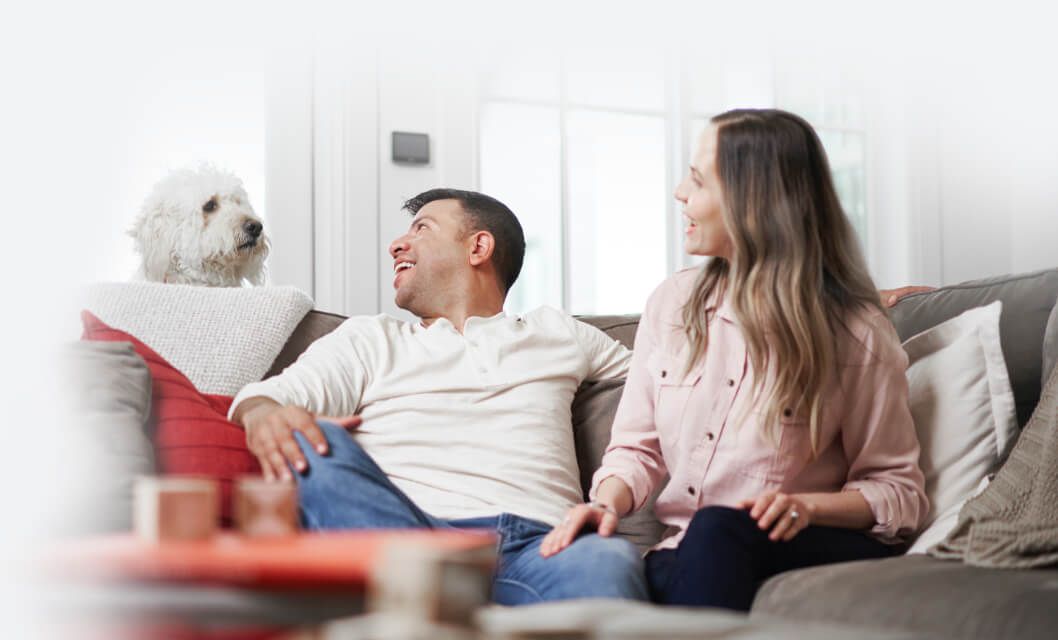 family sitting on couch