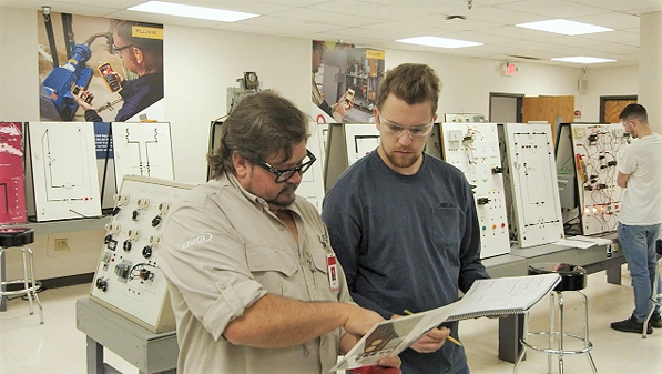 Technician servicing an HVAC system